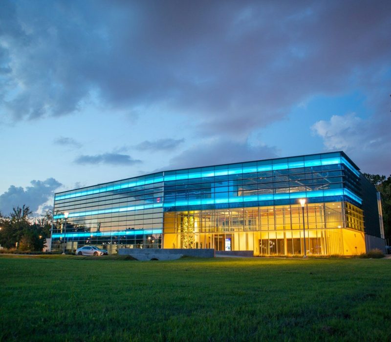 white and blue building under cloudy sky during daytime